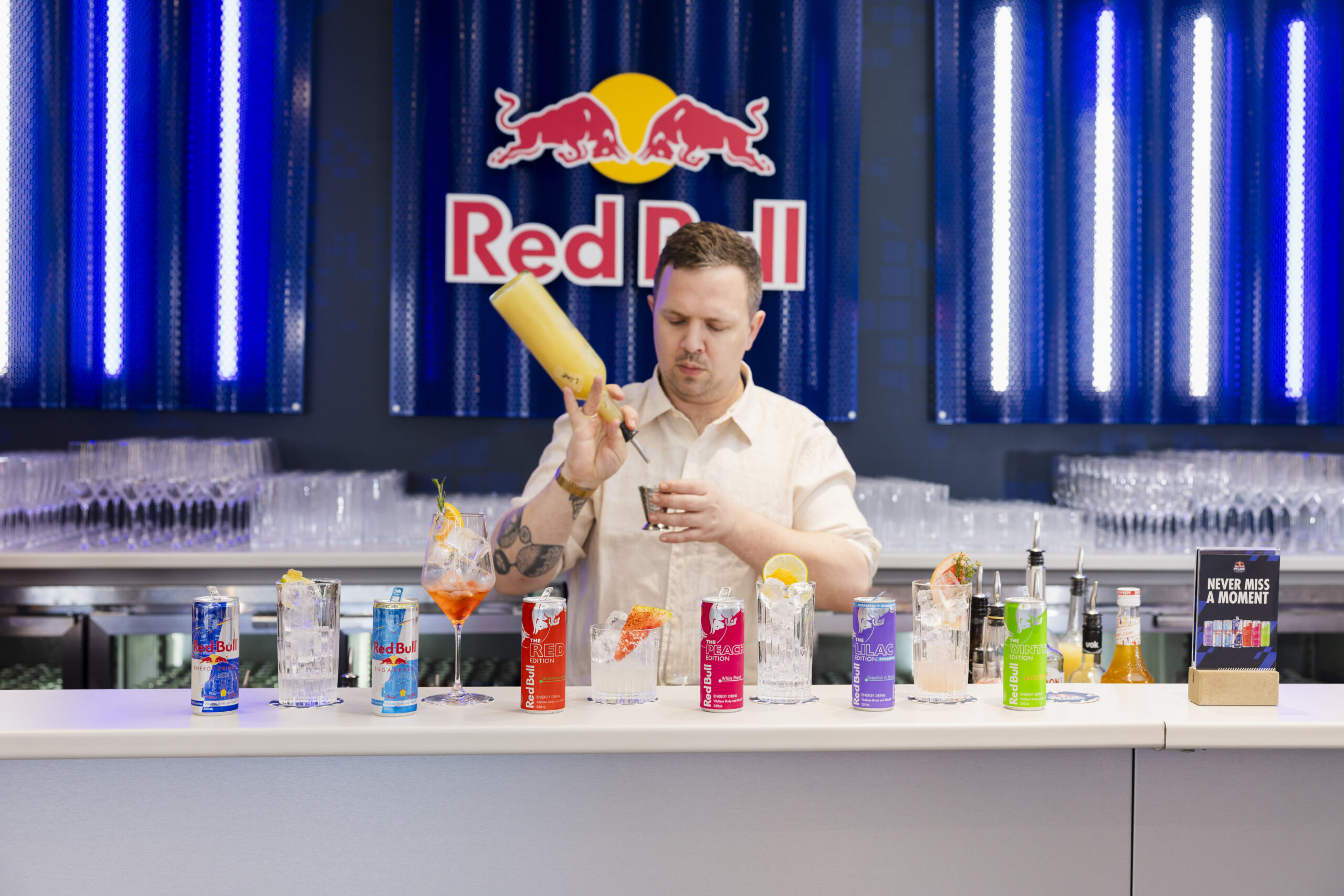 Sweet&Chilli bartender making signature Red Bull cocktail