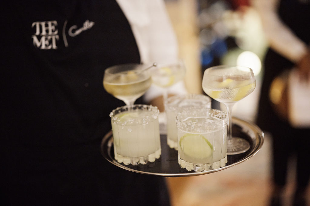 Margarita and wet martini cocktails served on a silver tray