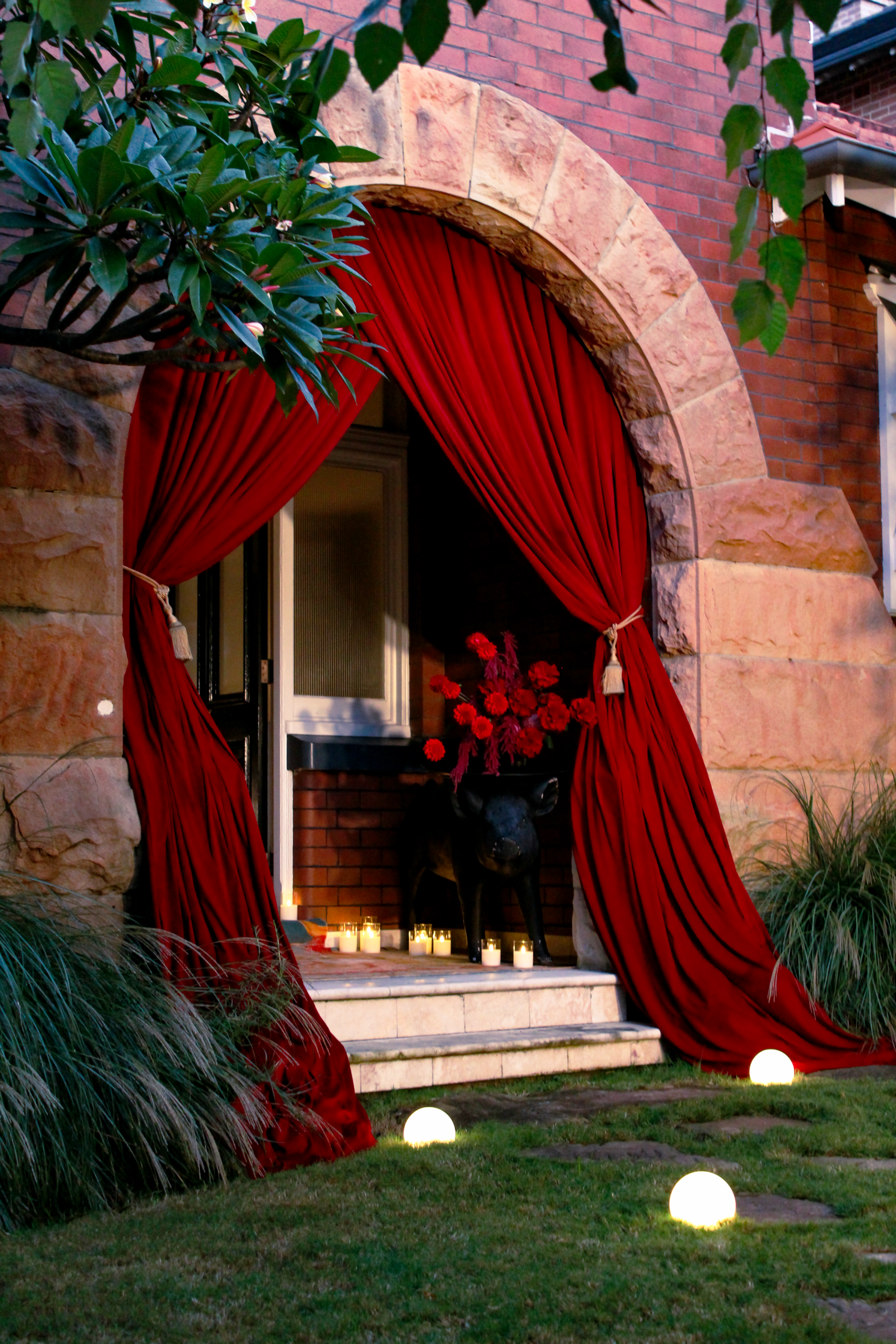 Grand curtain entrance and illuminated pathway
